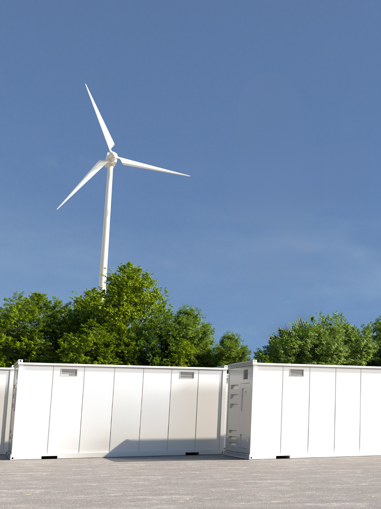 Eine Windturbine, im Vordergrund ein Batteriespeicher